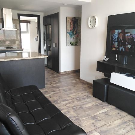 Apartasuites Av Medellín Esterno foto