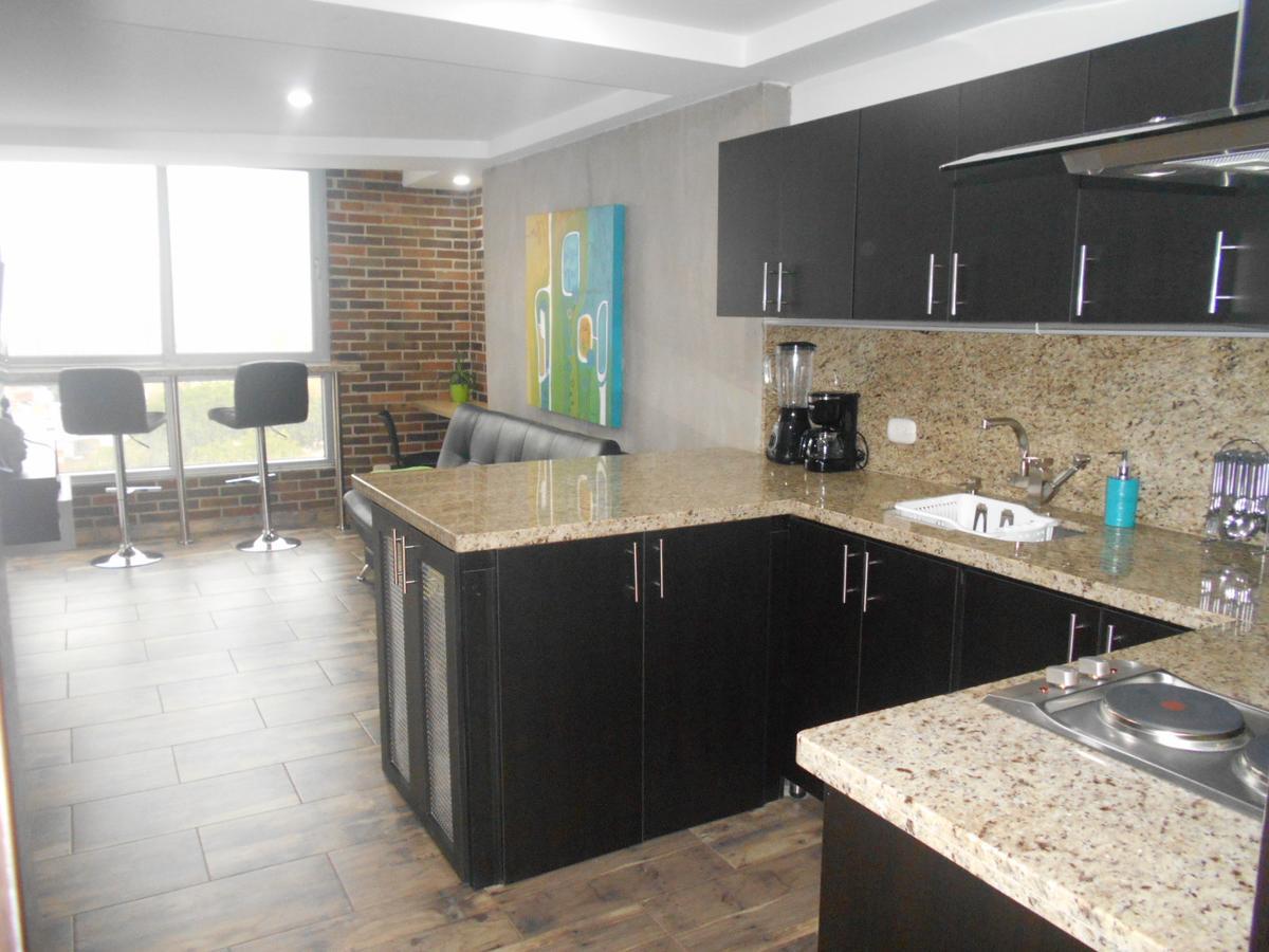 Apartasuites Av Medellín Esterno foto